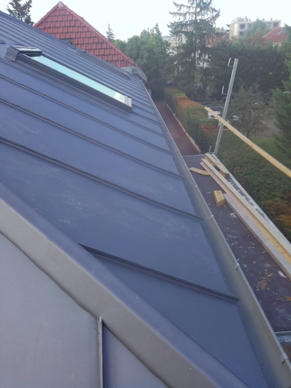 Pose couverture zinc surelevation