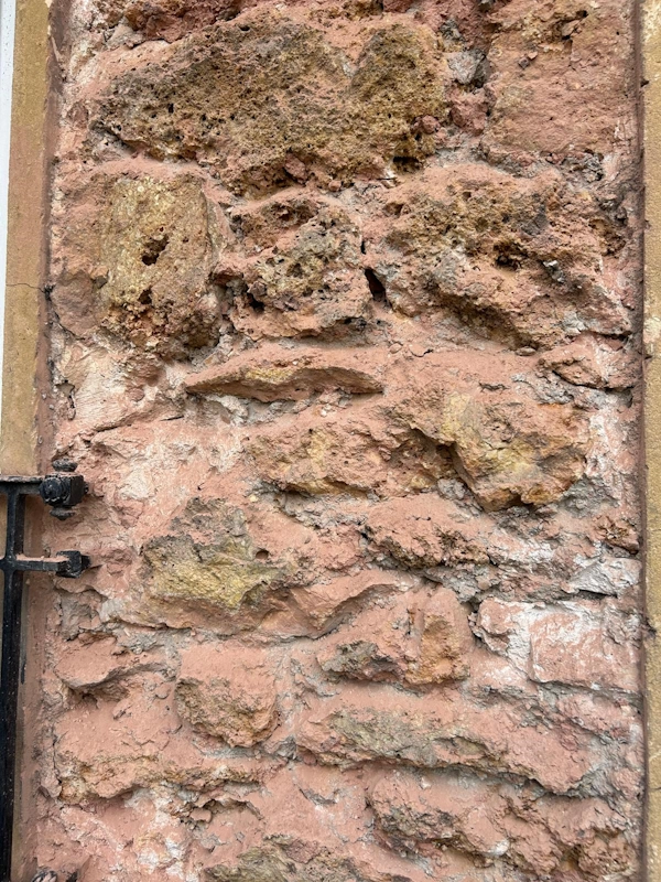 Piochage de facade en pierre 91