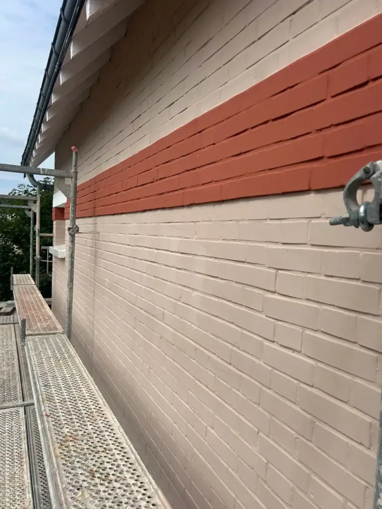 pose enduit brique clamart