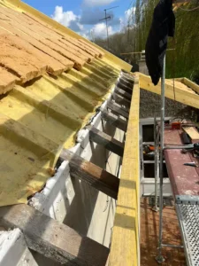 renovation toiture taverny maison individuelle travaux couverture tuile plate